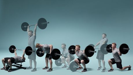 Person lifting weights with focus